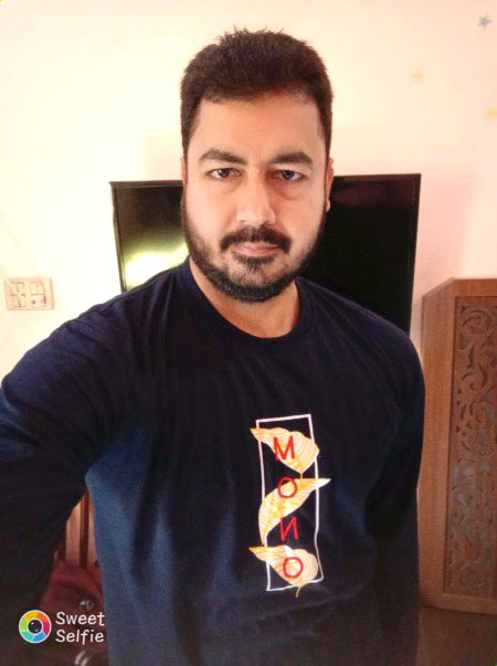 In blue shirt..