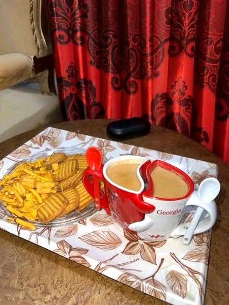 اک تیرا کپ 
اک میرا کپ 
ساتھ ہلکی پھلکی گپ شپ