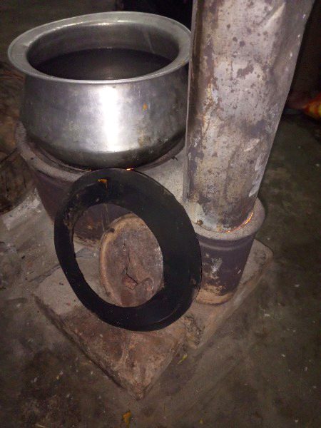 Enjoying fire heat rainy day