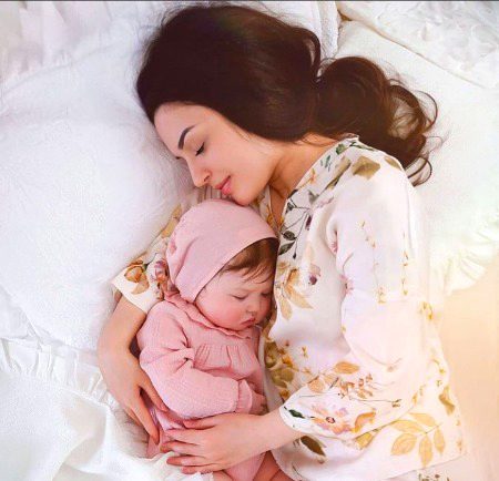 The best place to sleep on is a mom's arms🤍🧡